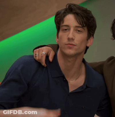 Man With Ring Beside Another Man GIF