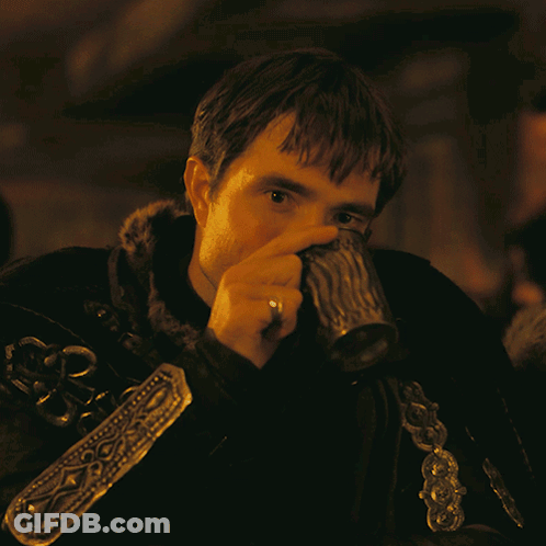 Man With Ring Drinking From Silver Mug GIF