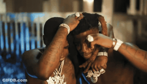 Man With Ring Holding Another's Head GIF