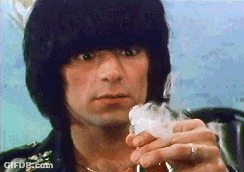 Man With Ring Holding Beer GIF