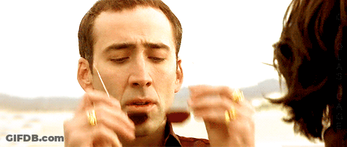 Man With Ring Holding Cigarette GIF