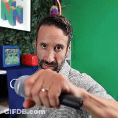 Man With Ring Holding Microphone GIF