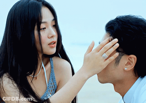 Man With Ring Kissing Woman GIF