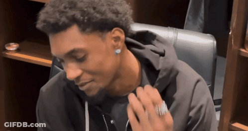 Man With Ring Looking Down GIF