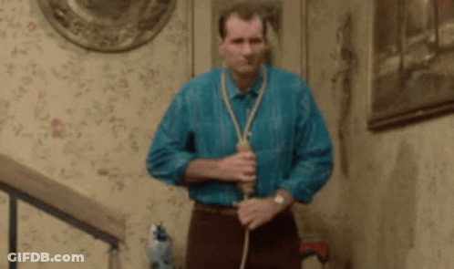 Man With Rope Around Neck On Stairs GIF