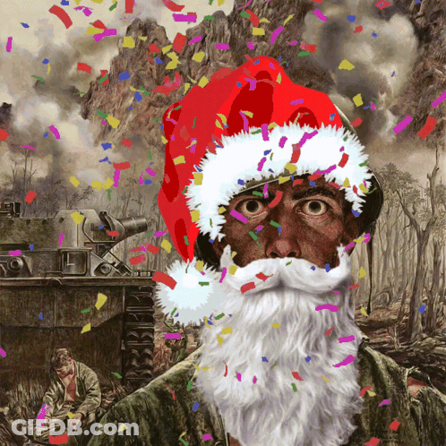 Man With Santa Hat And Beard Surrounded By Confetti GIF
