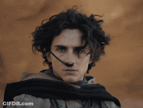 Man With Scarf And Microphone On Nose GIF
