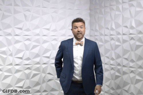 Man With Scarf In Front Of #ModernWarfare Wall GIF