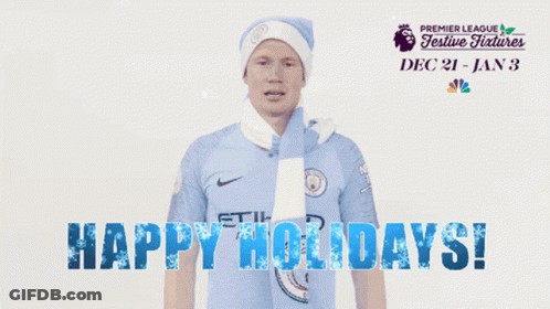 Man With Scarf Saying Happy Holidays GIF