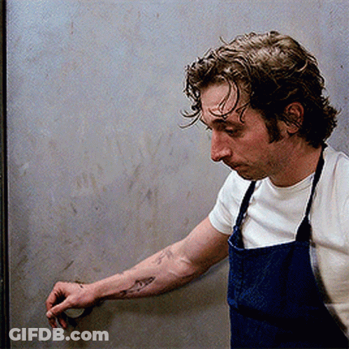 Man With Shark Tattoo And Apron GIF