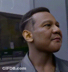 Man With Shaved Head Looking Up GIF