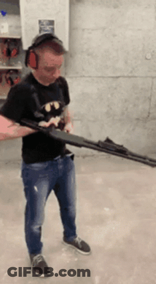 Man With Shotgun Aiming For Accuracy GIF