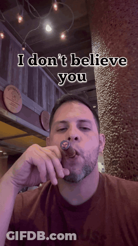 Man With Sign Saying Mc A Good Loser GIF