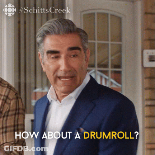 Man With Skull And Crossbones Shirt Playing Drums GIF