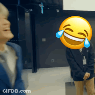 Man With Smiley Face Laughing GIF