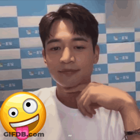 Man With Smiley Face Sticking Tongue Out GIF