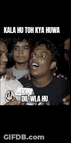 Man With Smiley Shirt Saying Kala Hu Toh Kya Huwa Dil Wala Hu GIF