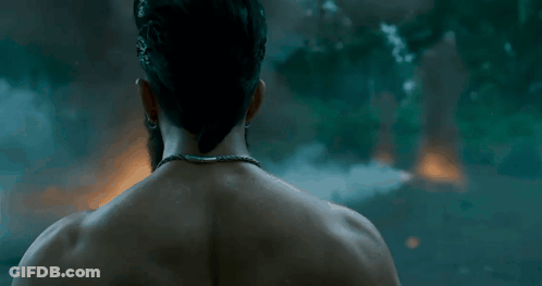 Man With Snake Around Neck Looking GIF
