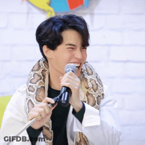 Man With Snake Holding Microphone GIF