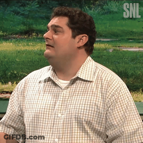 Man With SNL Logo Shirt GIF