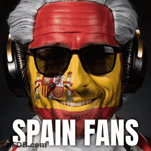 Man With Spanish Flag On Face And Headphones GIF