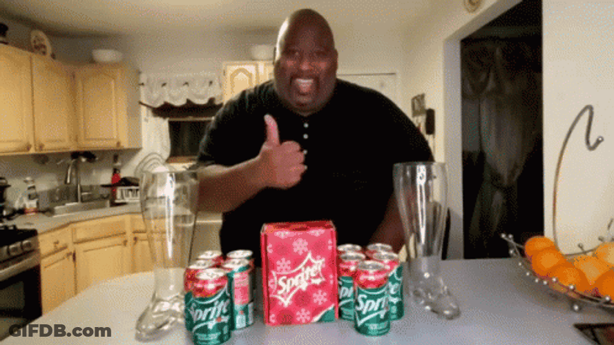 Man With Sprite Cranberry In Cans On Table GIF