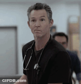 Man With Stethoscope In Black Shirt GIF