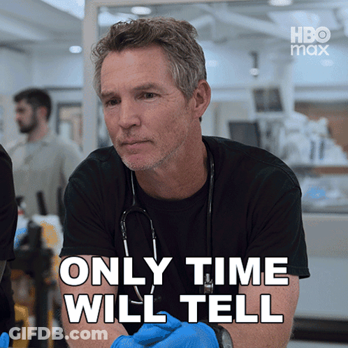 Man With Stethoscope In Front Of Only Time Will Tell Sign GIF