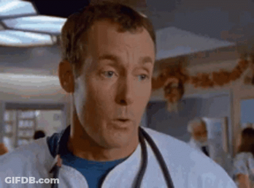 Man With Stethoscope In Hospital Room GIF