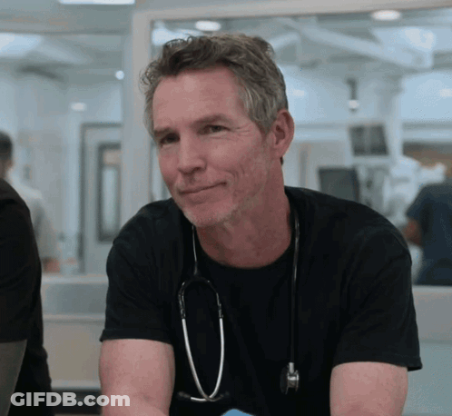 Man With Stethoscope Looking At Camera GIF