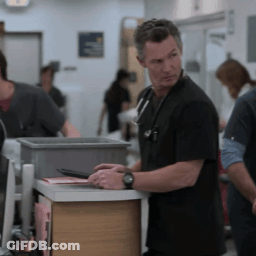 Man With Stethoscope Standing Next To Another Man GIF