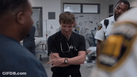 Man With Stethoscope Talking In Ambulance GIF
