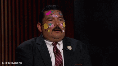 Man With Stickers Giving Thumbs Up GIF