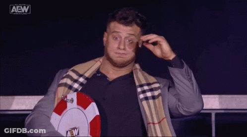 Man With Suit And Scarf Holding AEW Life Preserver GIF