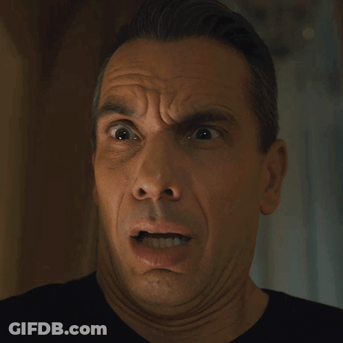 Man With Sunglasses And Bandana Says Hey GIF