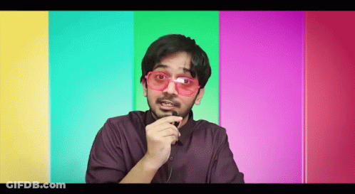 Man With Sunglasses And Beard Talking Into Microphone GIF
