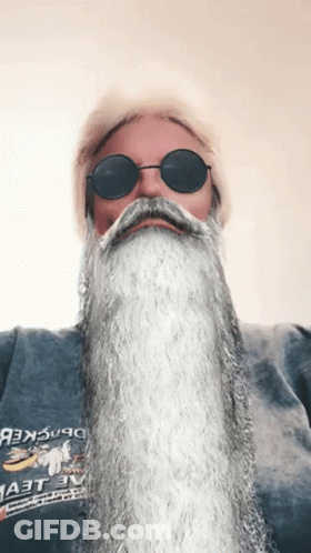 Man With Sunglasses And Beard Wearing Masters Shirt GIF