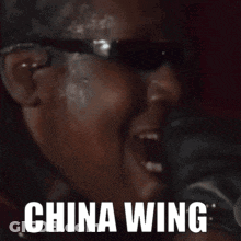 Man With Sunglasses And China Wing GIF