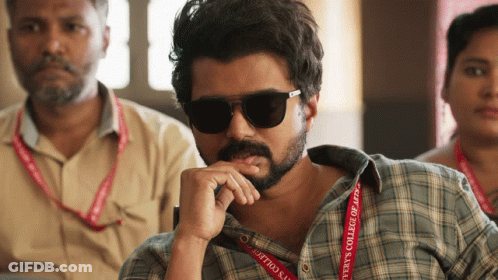 Man With Sunglasses And College Of Arts Lanyard GIF