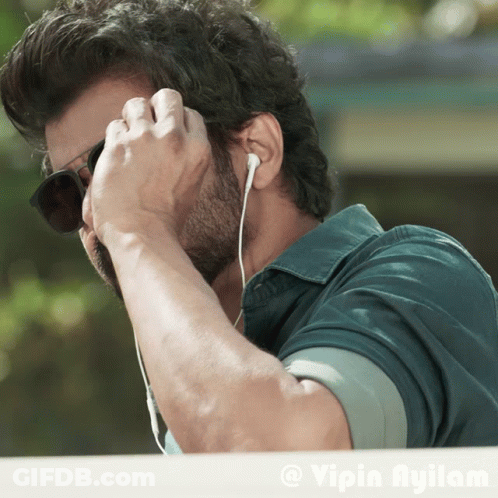 Man With Sunglasses And Ear Buds Vipin Ayilam GIF