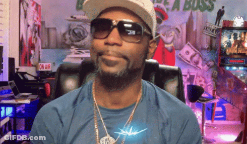 Man With Sunglasses And Hat At On Air Sign GIF