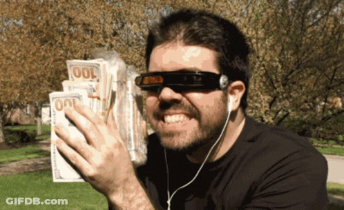Man With Sunglasses And Headphones Holding $100 Bills GIF