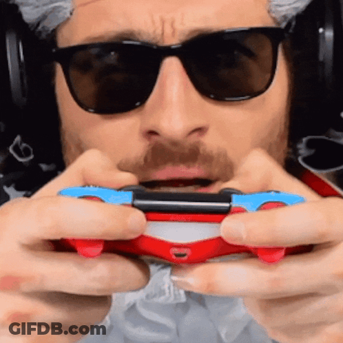 Man With Sunglasses And Headphones Holding Video Game Controller GIF