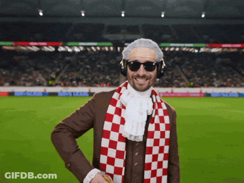 Man With Sunglasses And Scarf At Soccer Field GIF