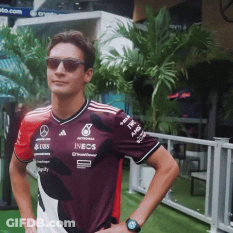 Man With Sunglasses And UBS Shirt GIF
