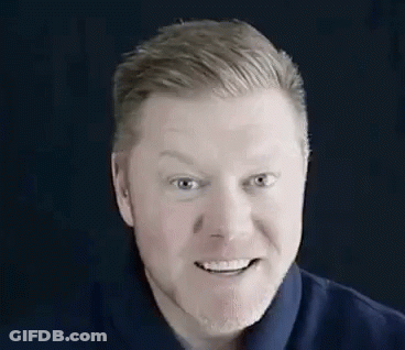 Man With Sunglasses And Yellow Shirt In Car GIF