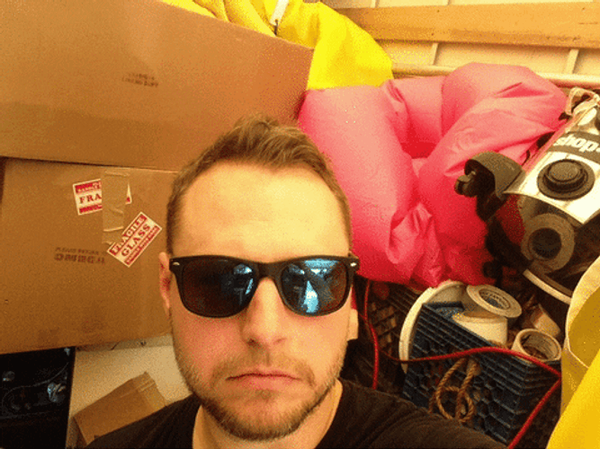 Man With Sunglasses Face Melt GIF