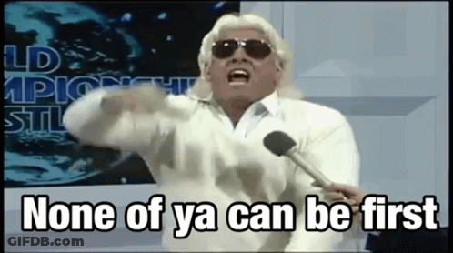 Man With Sunglasses Holding Microphone Saying None Of Ya Can Be First GIF