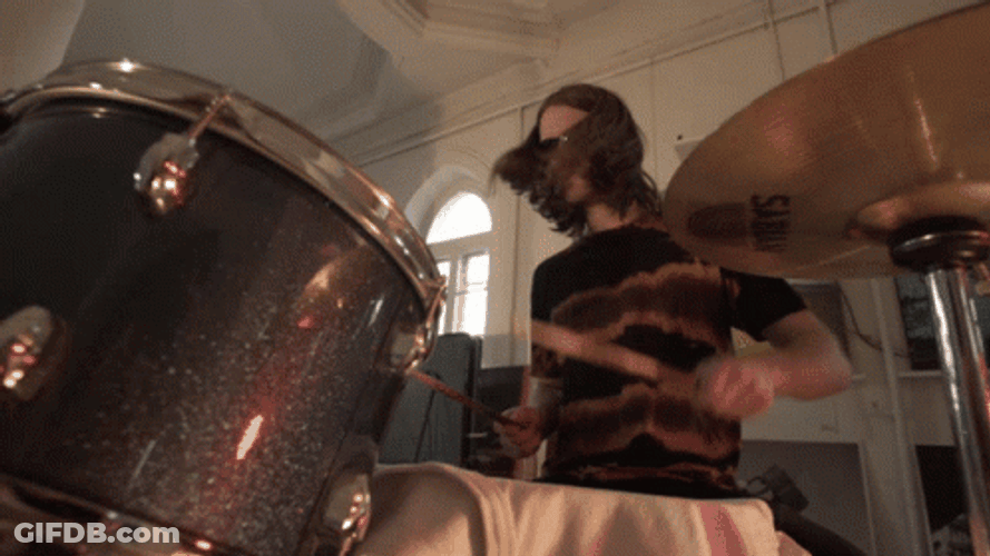 Man With Sunglasses Playing Drum GIF