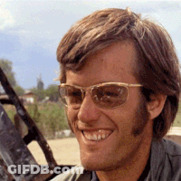 Man With Sunglasses Smiling In Car GIF